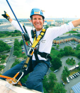 Wyndham Hotel Group President/CEO Geoff Ballotti rappelled down a building to raise awareness for Shatterproof.