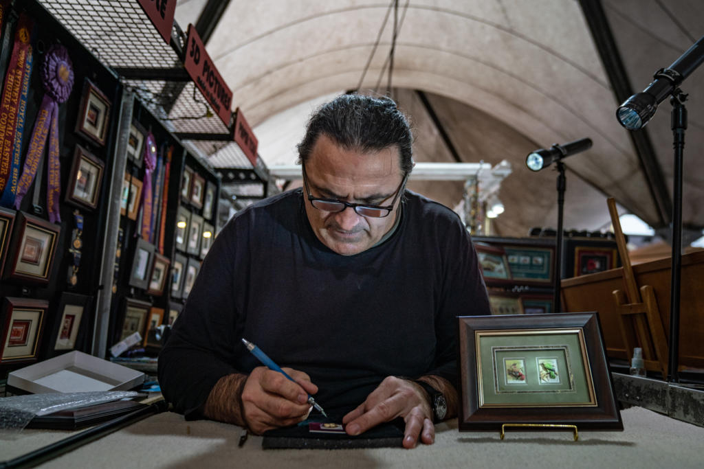 In Australia, an artist creates paper toles—the art of layering paper images to create a 3D effect.