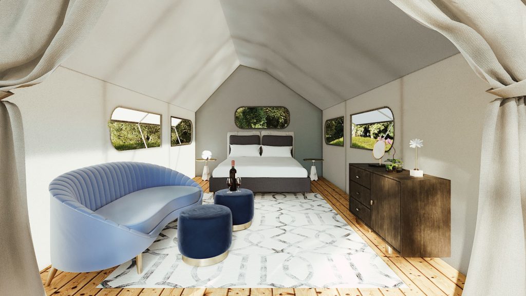 An interior view of a furnished Glampique tent.